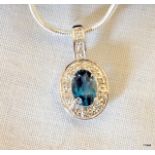 A 9ct White Gold and Blue Topaz Pendant Necklace