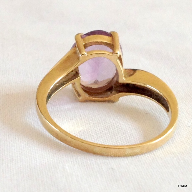 A ladies 9ct gold Amethyst and diamond ring size Q - Image 2 of 3