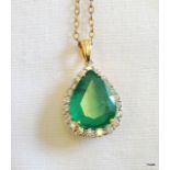 An 18ct Emerald and Diamond Pendant Necklace. Approx 5ct Emerald and 1ct Diamonds