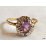 A 9ct gold ladies Amethyst and diamond ring size l/m