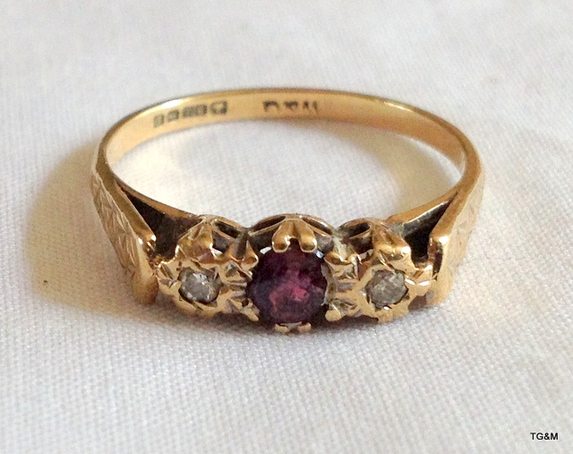 A 9ct gold ladies ruby and diamond ring size p/q