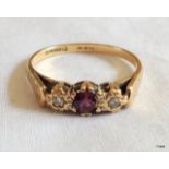 A 9ct gold ladies ruby and diamond ring size p/q