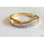 A 9ct gold ladies diamond crossover ring size Q