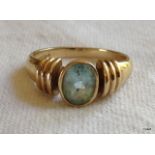 A ladies 9ct gold and aquamarine ring. size P