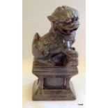 Chinese carved soapstone figure of a Lion/Fo dog on a plinth 18cm high