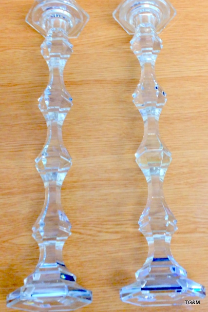 A pair of good quality cut glass candle sticks 46cm high