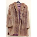 A ladies Fur coat by Rossiters of Paignton