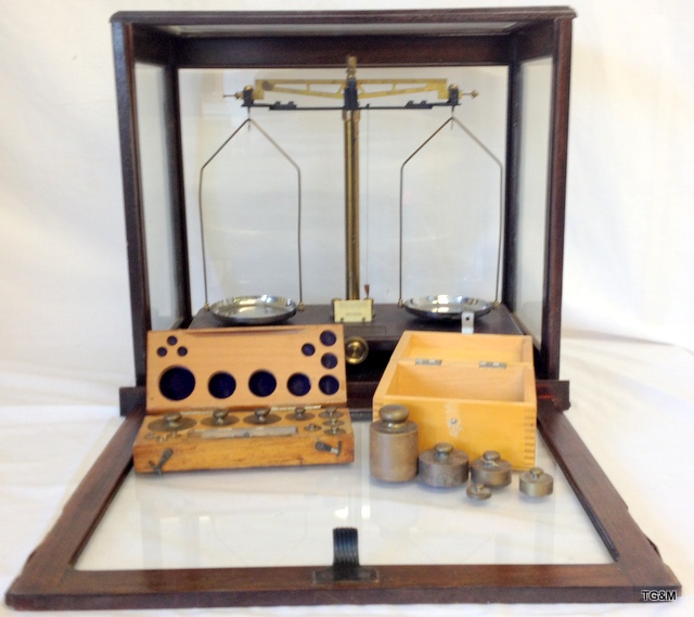 A mahogany cased set Griffin & Tatlock Ltd microid balance scales with two sets of weights