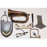 Assorted military items including a Royal Green Jackets shield - pair of spurs - whistle on
