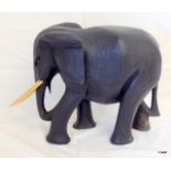 An African Tribal art carved model of an elephant 26 x 30 x 15cm