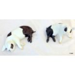 A pair of Kaiser West German porcelain pigs