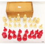 A Victorian bone chess set with wooden case
