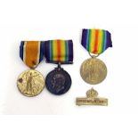 A mounted WW1 medal pair to 33635 Private HECF Toy of the Hampshire Regiment with a Victory medal to