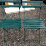 Two metal and wood garden chairs