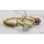 Three 9ct gold rings to include diamond