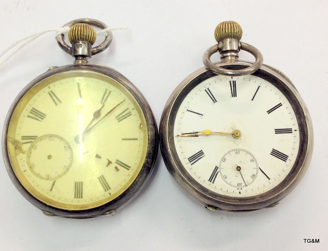 Two full size silver pocket watches