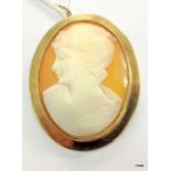 A gold cameo brooch