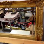 a gilt framed mirror