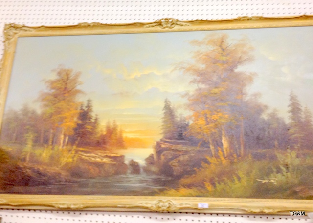 A large oil covering depicting a woodland and river scene