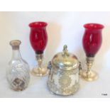 A silver topped decanter and a silver plated ice bucket dated 1888