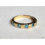 A 9ct gold aquamarine ring size N