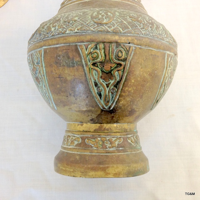 A pair of Islamic bronze vases 20cm - Image 4 of 6