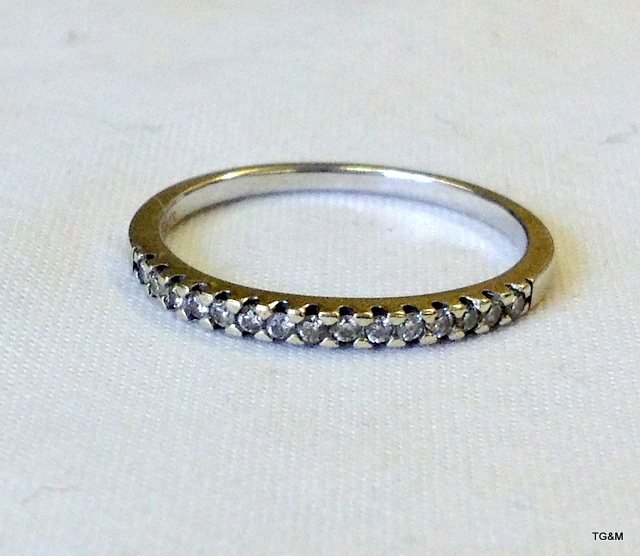 A 9ct white gold diamond1/2 eternity ring size M