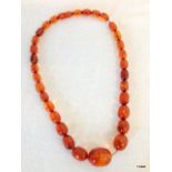 A set of amber beads of graduated size