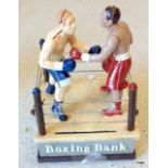 A money box in the form of a boxing ring