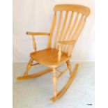 An Elm/Pine farmhouse rocking chair 106 x 67 x 90