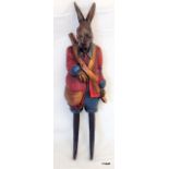 A wall hanging coat hook in the form of a hare