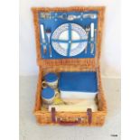 A vintage wicker picnic hamper