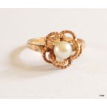 A 9ct gold hallmarked pearl set ring size L