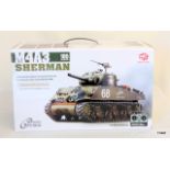 A radio controlled model of a M4A3 Sherman tank - mint and boxed