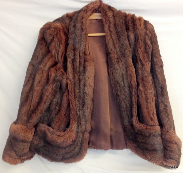 A ladies short fur coat by De Bella