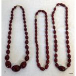 3 sets of bead necklaces possibly amber