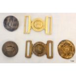 Five military belt buckles