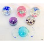 6 glass paper weights including Caithness largest 10cm