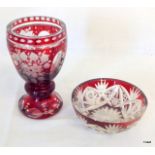 A Bohemian ruby red cut to clear glass goblet with etched garland decoration and a ruby red Bohemian