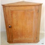 Stripped pine corner cupboard 32 inches wide by 36 inches high with original lock and key