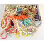 A large collection of bead necklaces