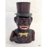 An American style cast iron money box 'Jolly Negro bank' wearing top hat