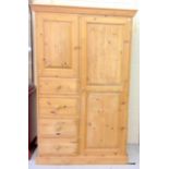 A Pine single wardrobe with side cupboard and 4 drawers 172 x 108 x 53