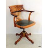 A swivel desk chair 87 x 60 x 60