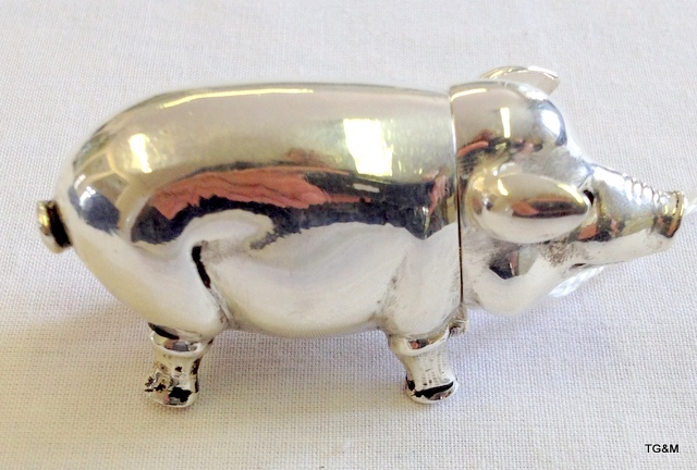 A large silver plated pig vesta case