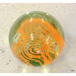 A glass ball paperweight