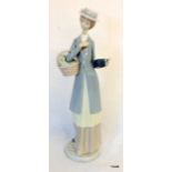 A Nao figure of a lady with an umbrella and flowers 38cm
