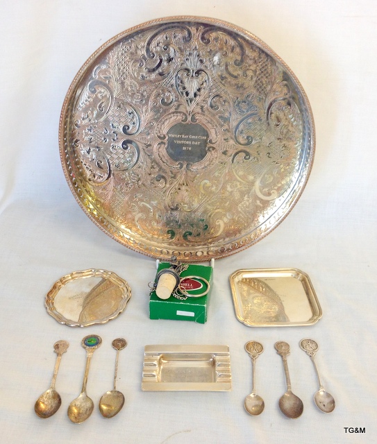 A mixture of silver and plate golf memorabilia