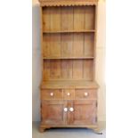 A pine Victorian 2 part dresser in small proportions