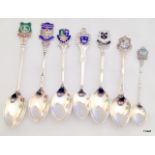 A mixed quantity of silver tourism spoons